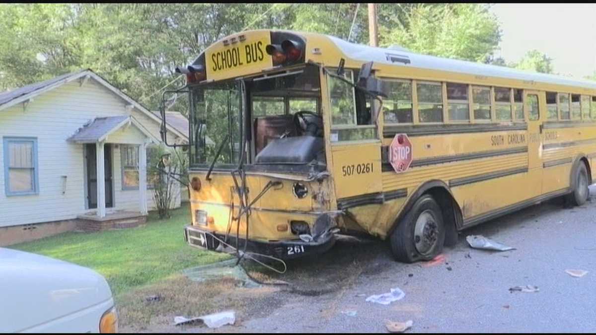 1 dead in school bus, van crash