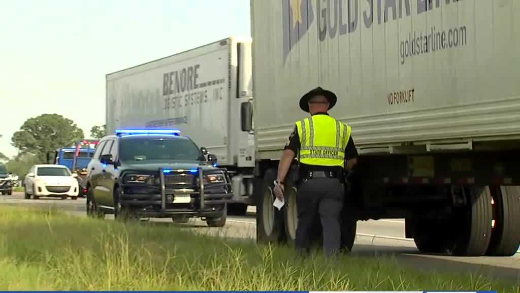 Overturned vehicle impacts I-16 near Bulloch-Bryan County line, backing up traffic for miles