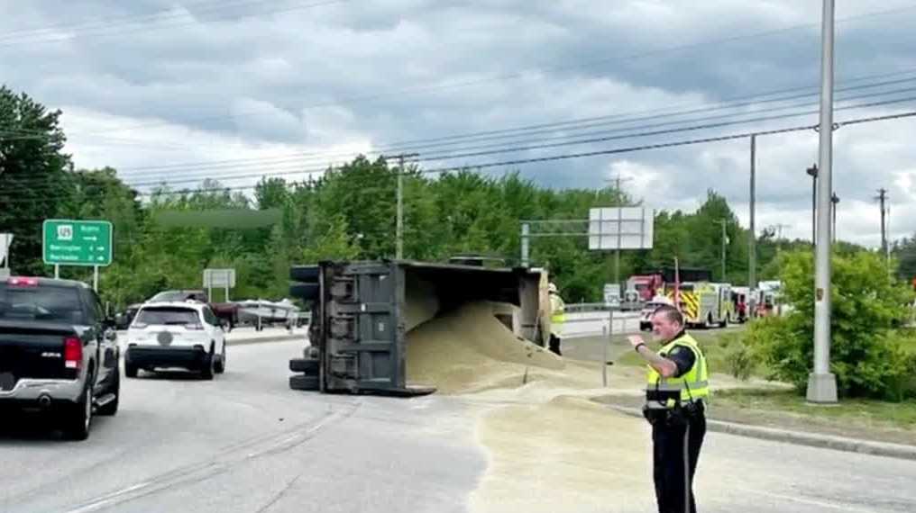 Lee, New Hampshire crash Truck rolls over, spilling sand