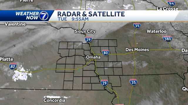 Windy with a sprinkle or flurry late Tuesday, staying cold