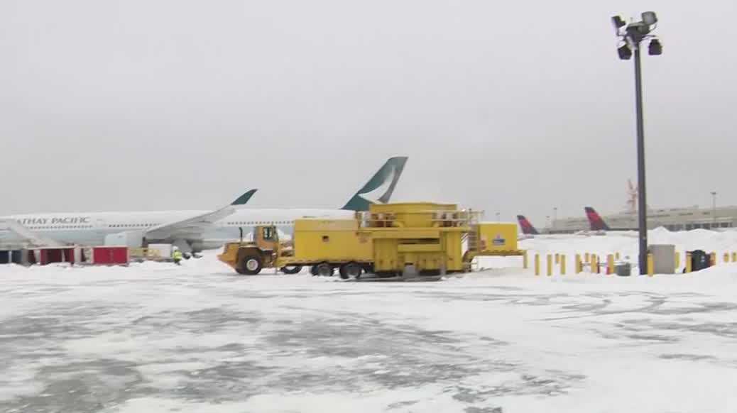 Logan Airport digging out from snow as operations slowly resume after ...