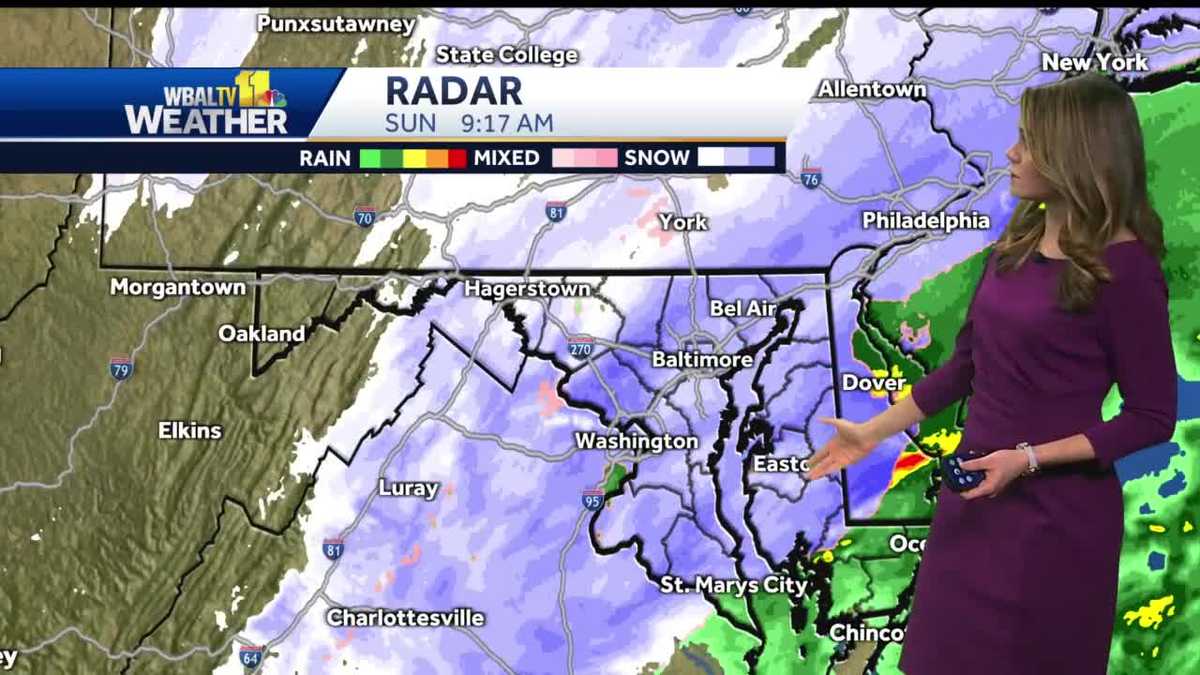 Steady snow falls, tapers off by afternoon