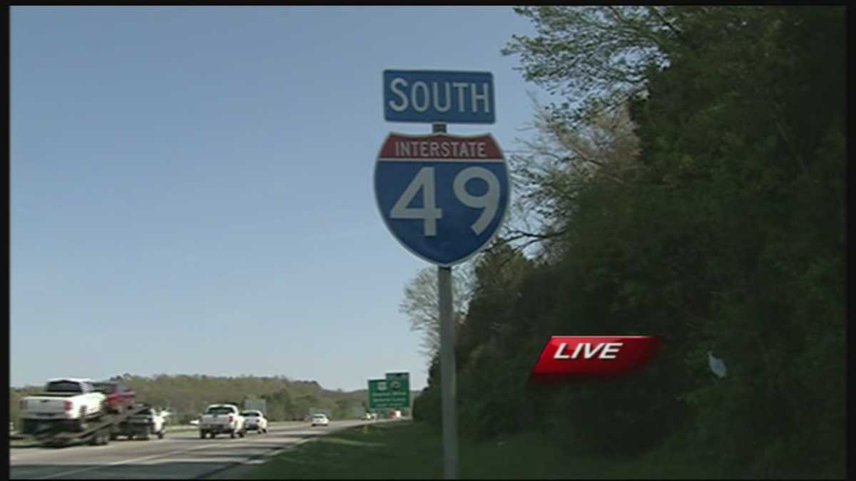 Crews switching road signs on the Interstate during rush hour