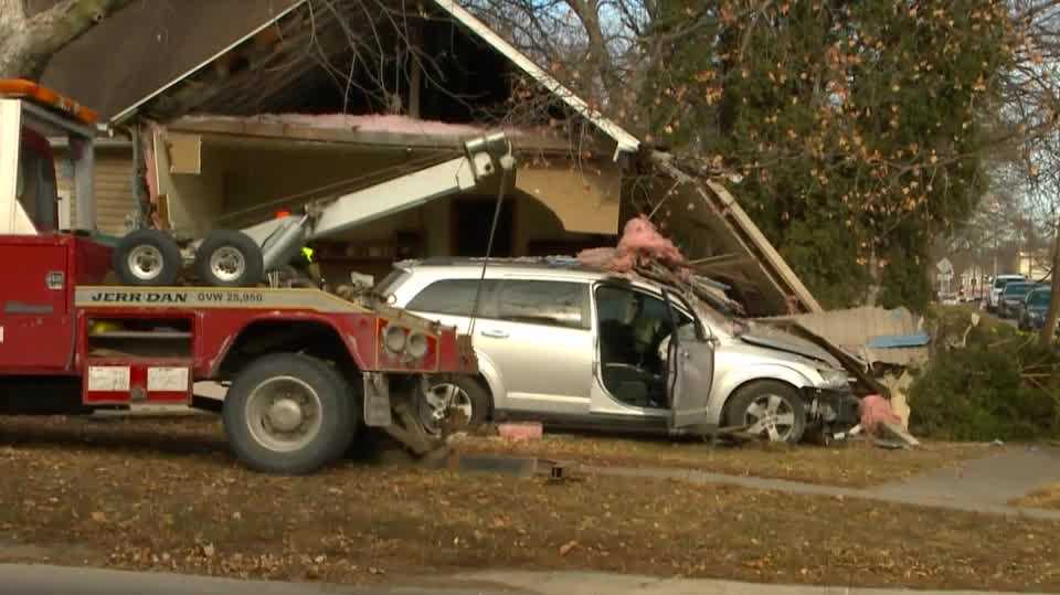 Adel family begins to clean up home after car crashes into the living room