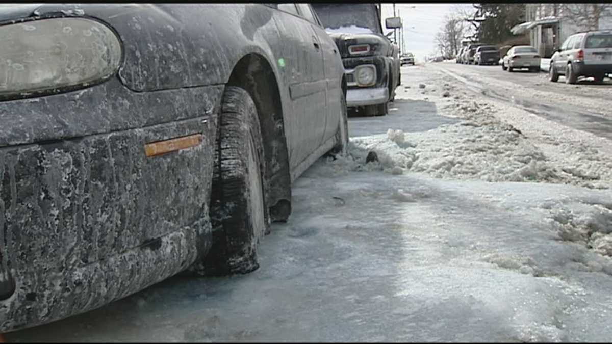 Cars frozen in place from water main break