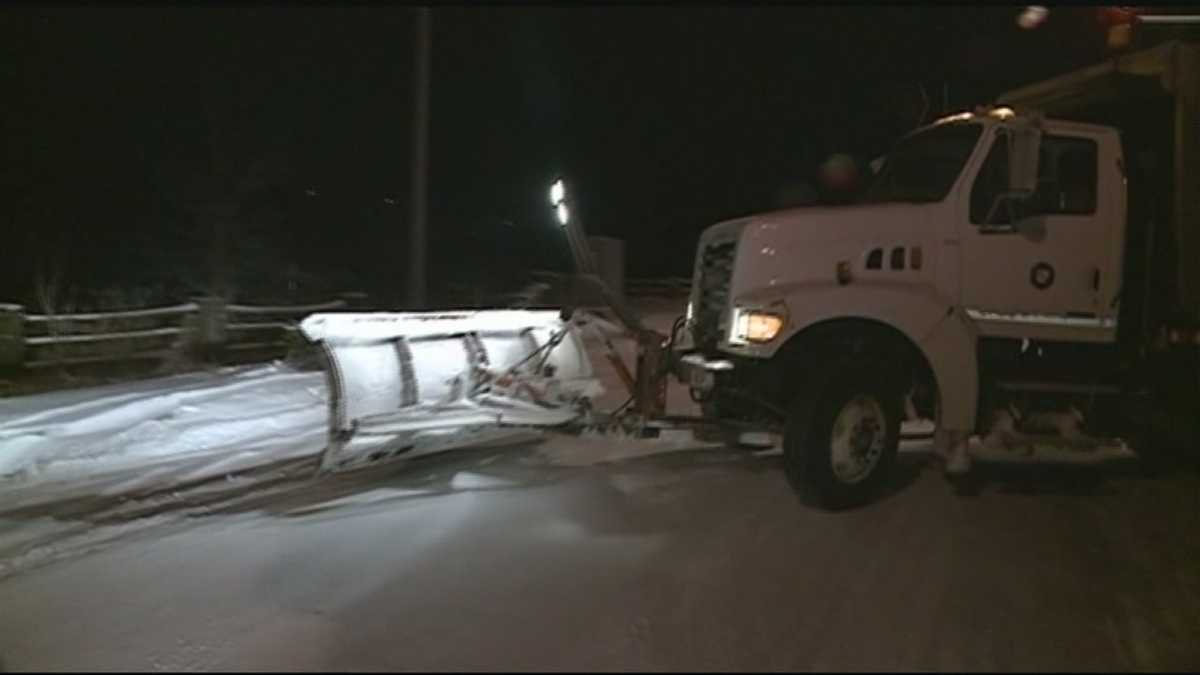 Road crews treat roads after snow storm