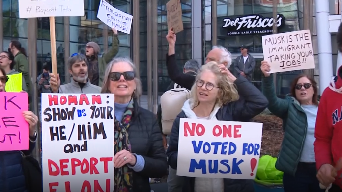 Hundreds gathered outside Boston Tesla showroom, protesting Elon Musk ...