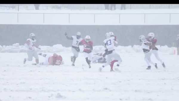 grand view wins playoff football game in snowstorm