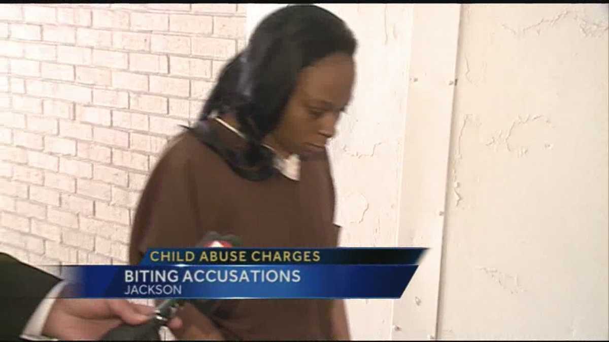 Mom accused of biting kids