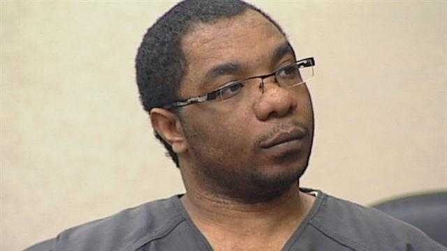 Man charged in connection with double slaying moves to withdraw guilty plea