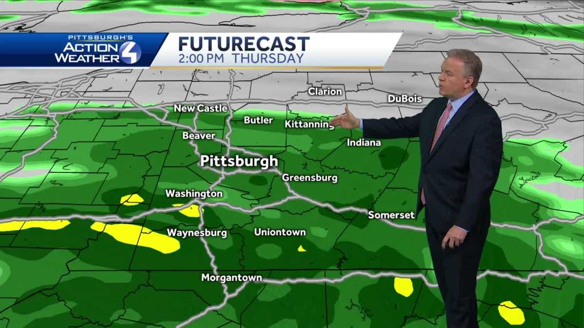 Cloudy with isolated showers tonight, widespread rain Thursday