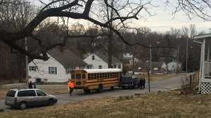 KC school bus collides with SUV
