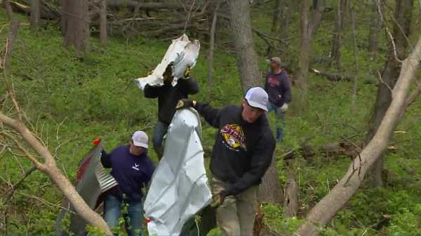 students clean up after tornado in monroe