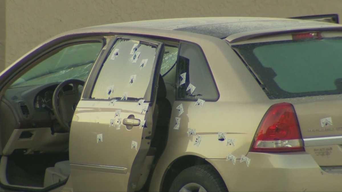 Woman, man found in bullet-riddled car