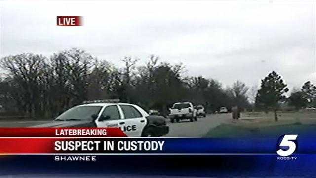 Husband of slain woman taken into custody