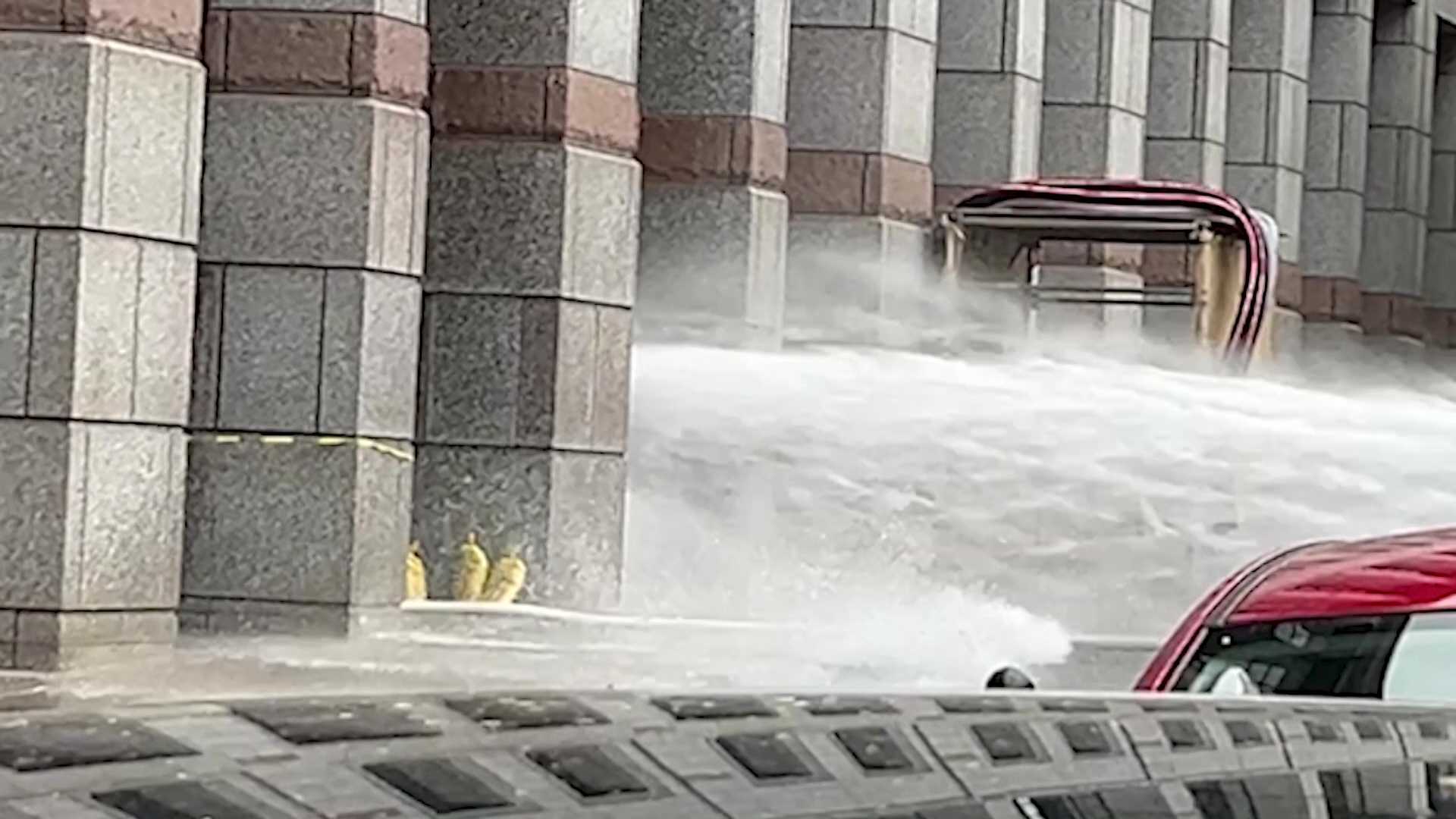 Water gushes across Boylston Street from Boston convention center - Vimarsana News