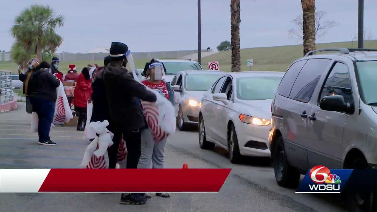 Parents packed the parking lot for drive-thru Toys for Tots in Kenner, Wednesday - Vimarsana News