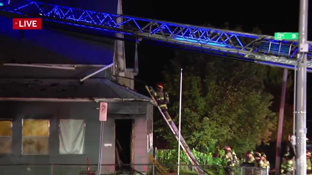 Omaha firefighters work for over an hour to extinguish house fire - KETV