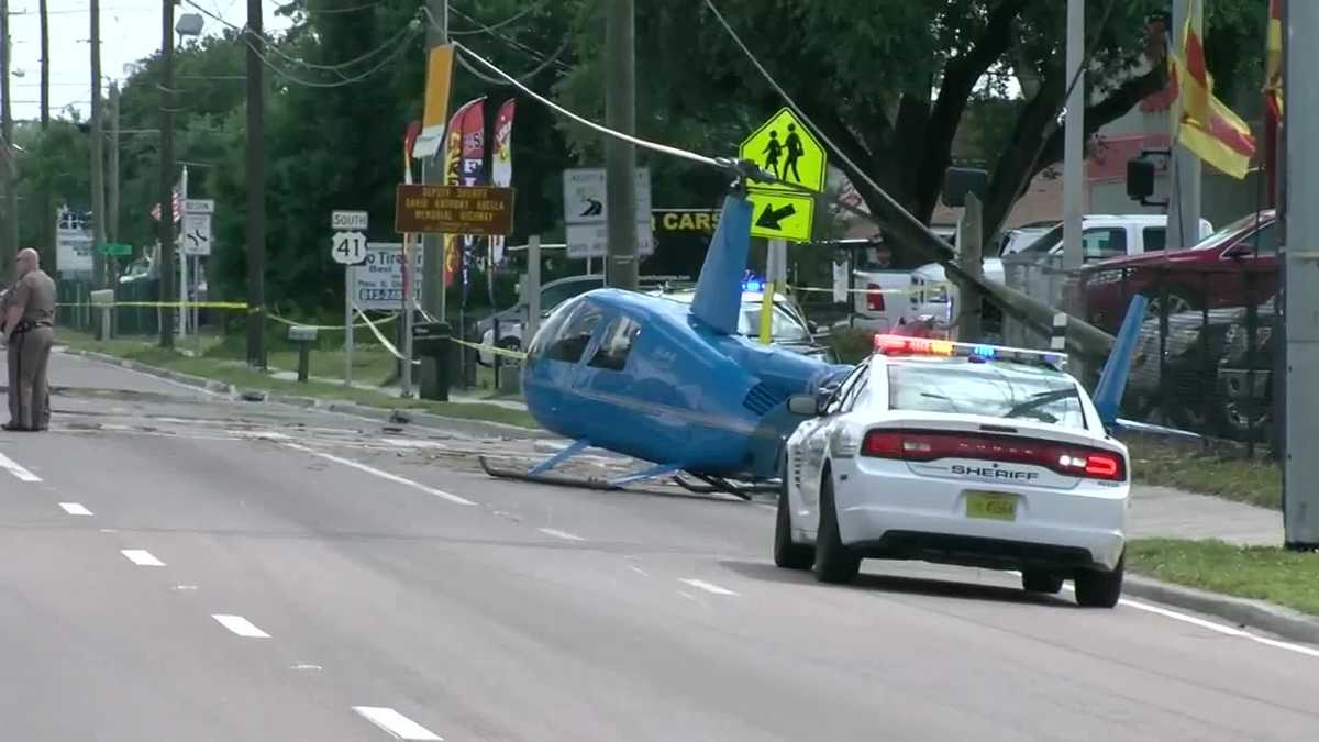 Helicopter crashes onto Florida highway; rotor blade hits truck