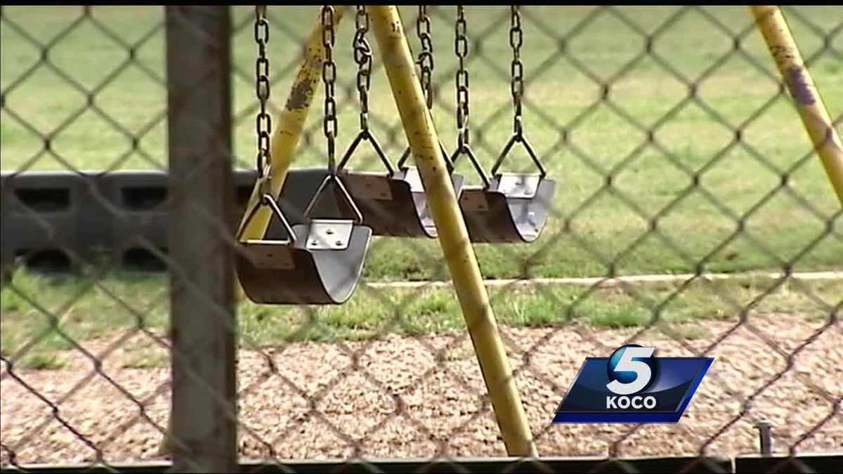 Man accused of pointing gun at school playground