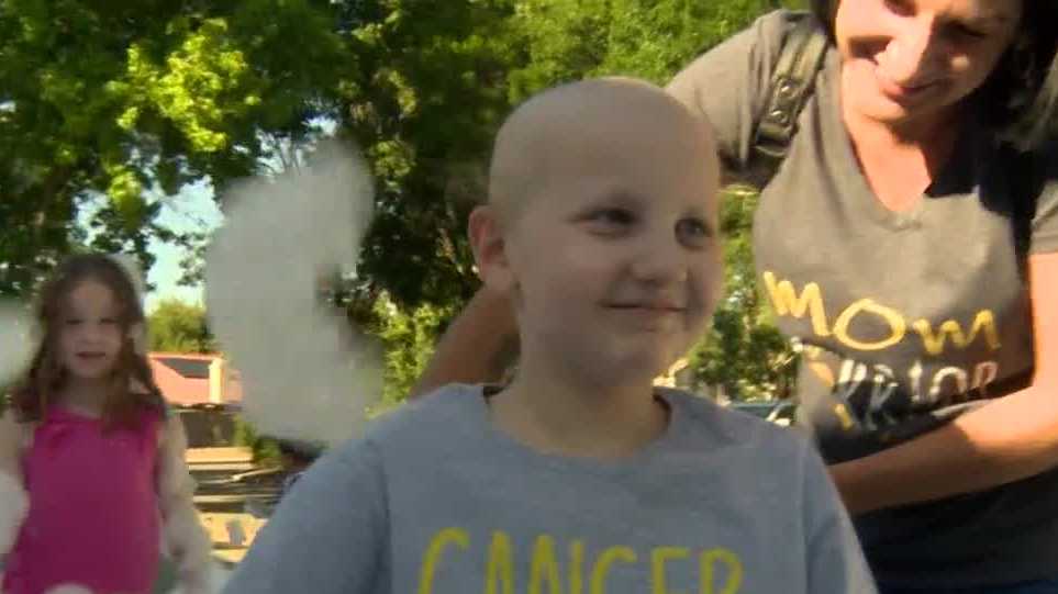 'You can do anything': 9-year-old welcomed home after brain cancer treatment