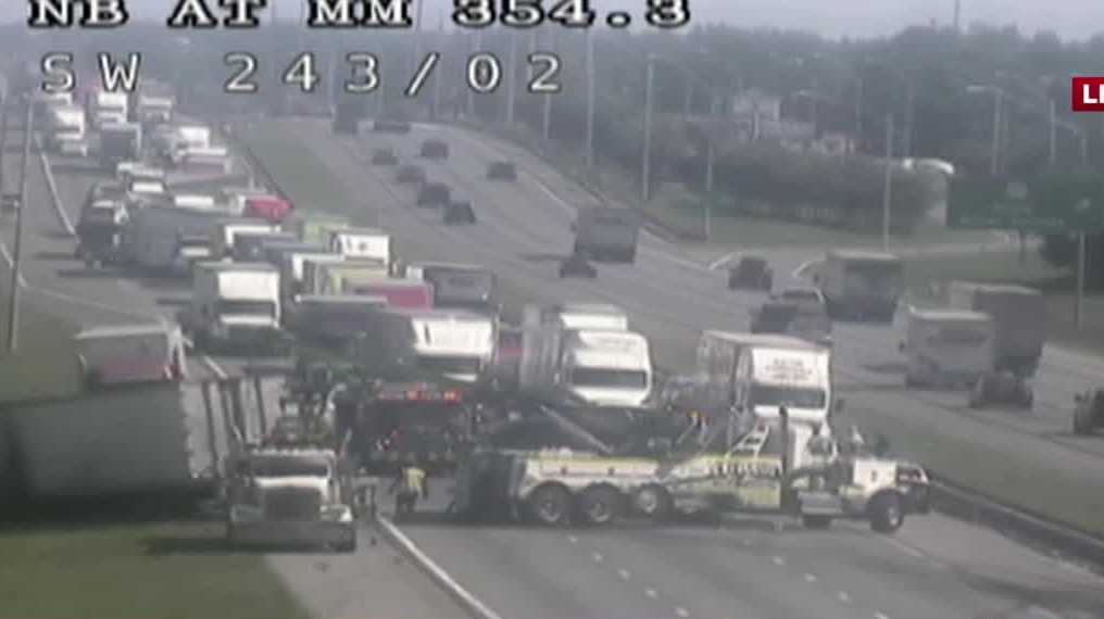 Fiery tractor-trailer crash shuts down I-75 in Marion County