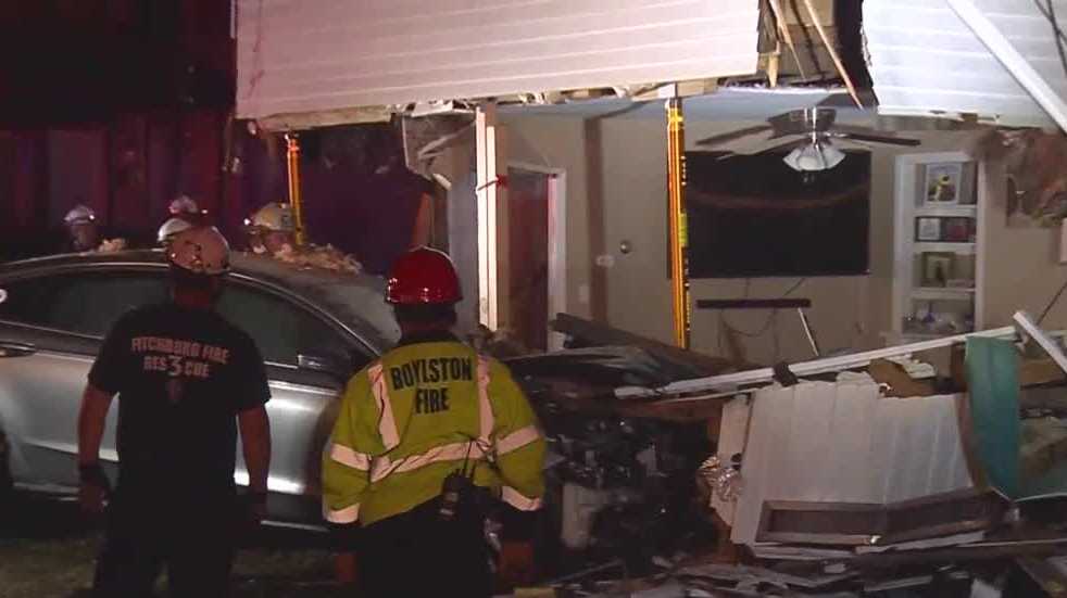 Car crashes into home in Clinton