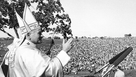 From Oct. 4, 1979: Pope John Paul II gives a papal blessing at the Living Farm, where an outdoor mass was celebrated and attended by an estimated 350,000 people.