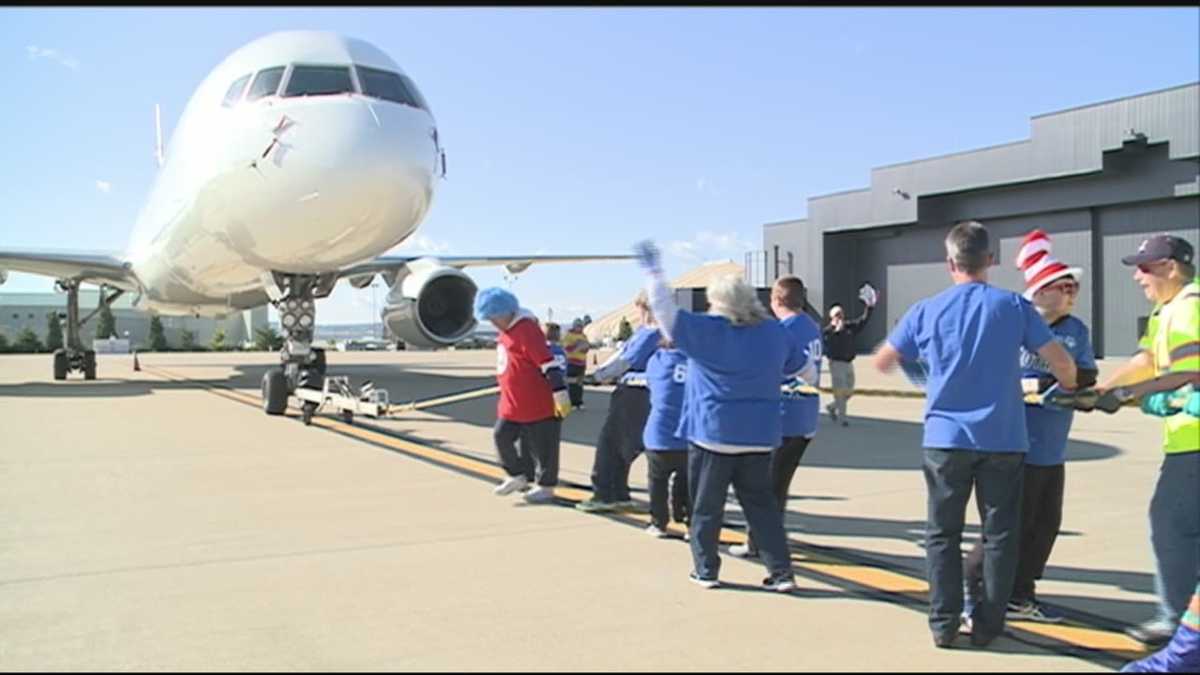 Teams pull planes to raise money for Special Olympics