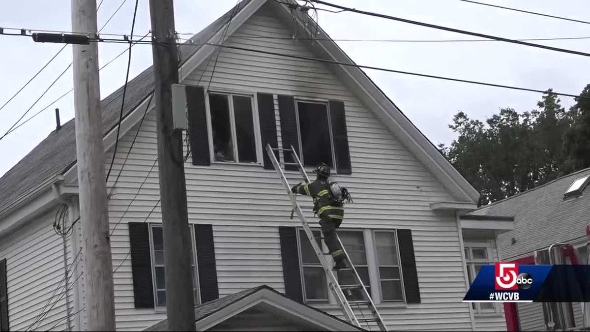 Father, son driving by help rescue people from burning home