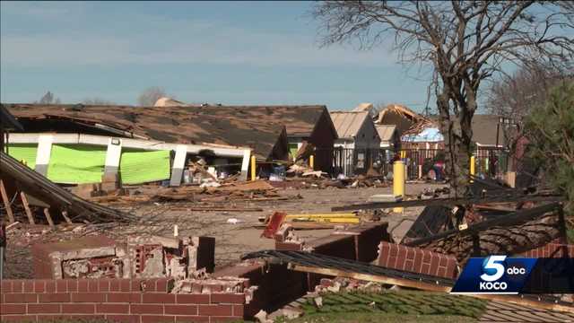 Pieces of storage facility thrown across street after storms in Norman - Vimarsana News