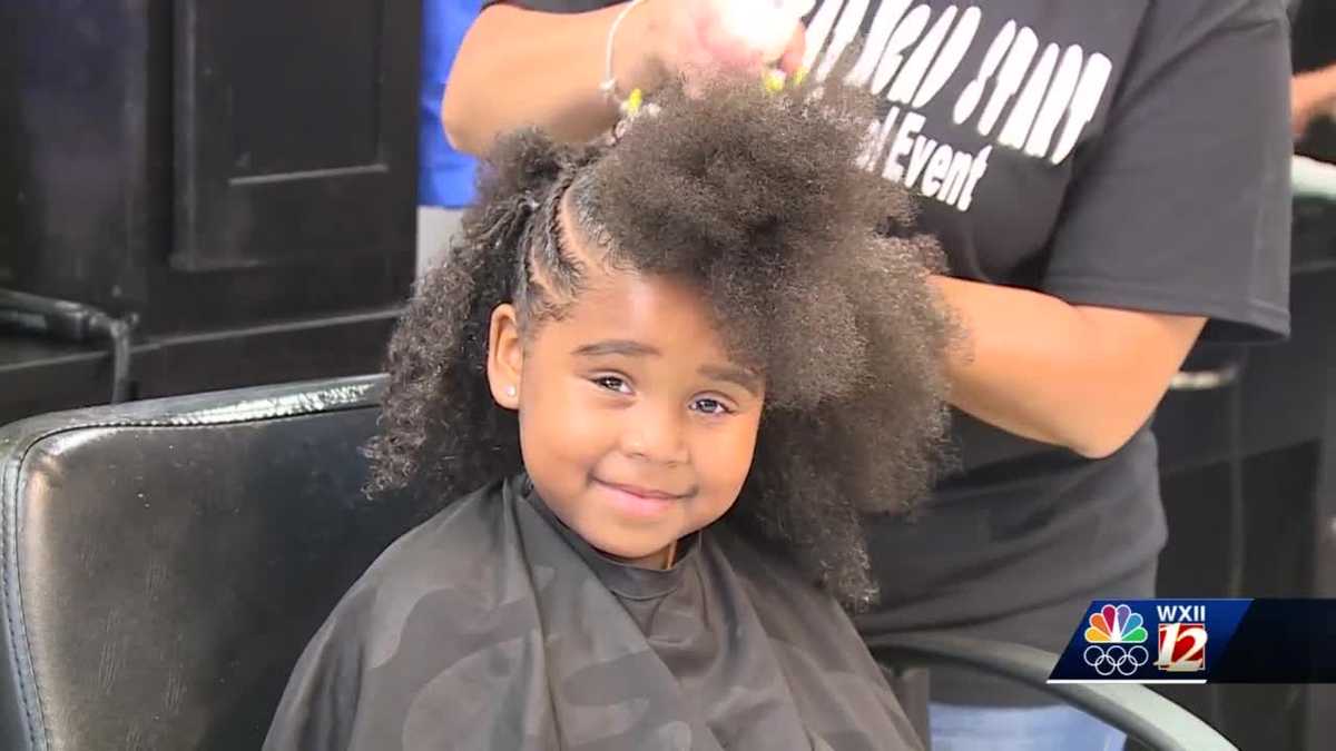 Students get free haircuts before first day of class