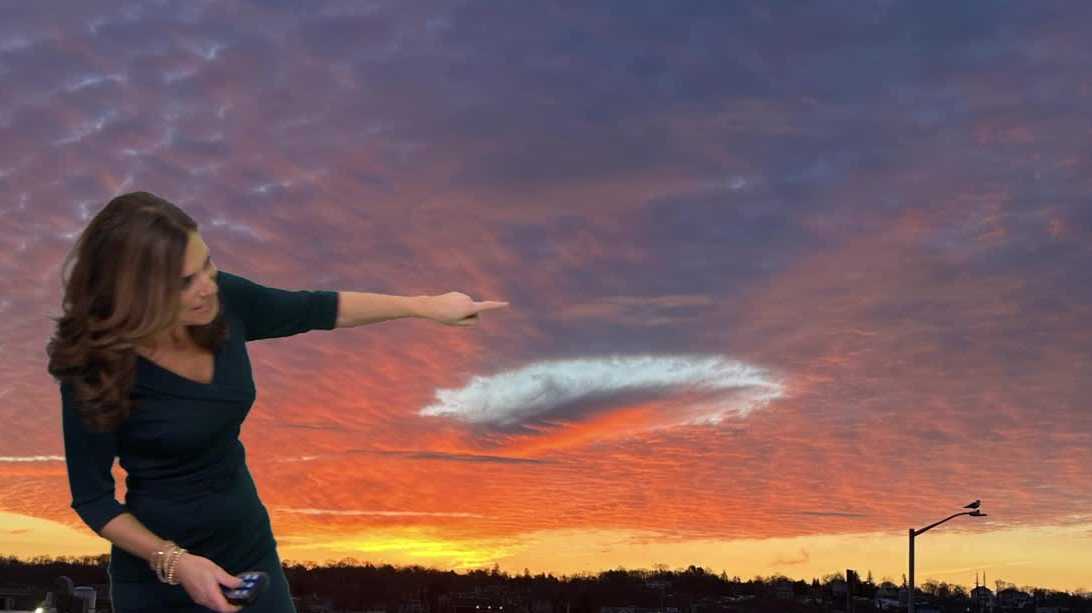 What causes the 'hole punch cloud' seen over Mass. on Tuesday?