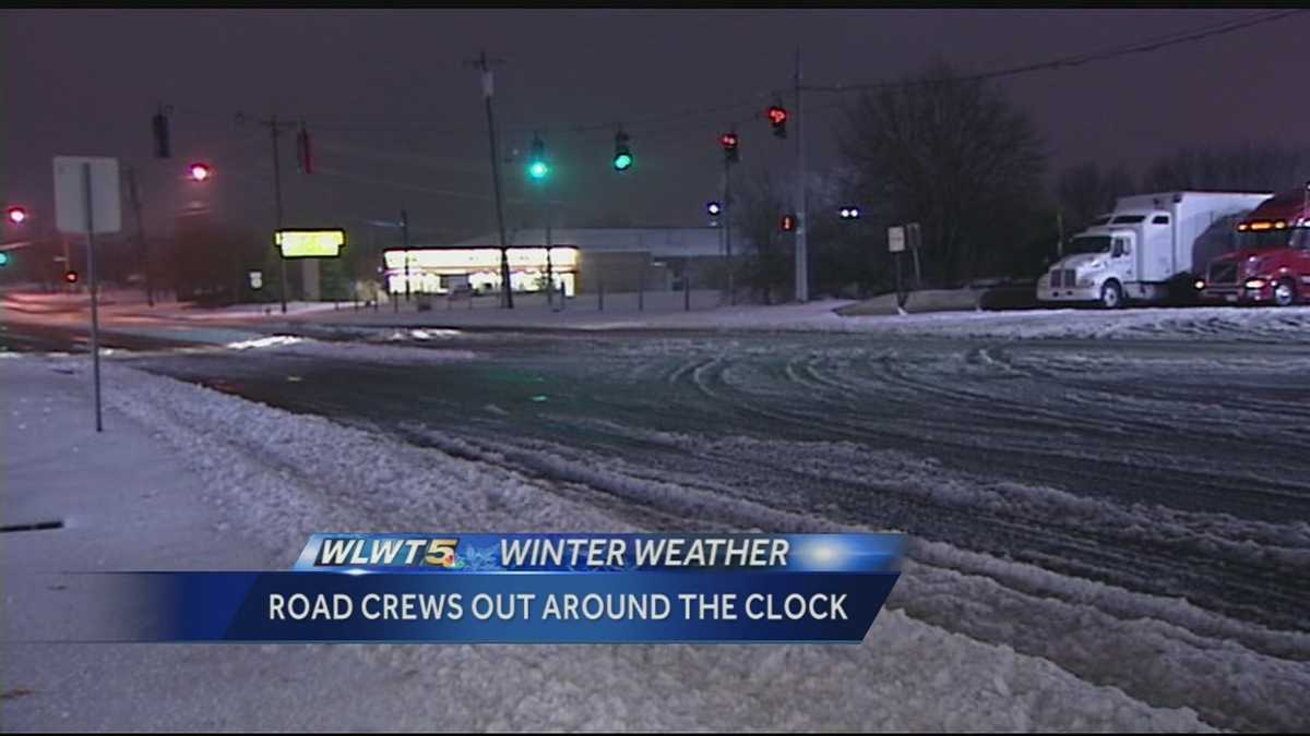 Road crews continue to try to keep roads clear