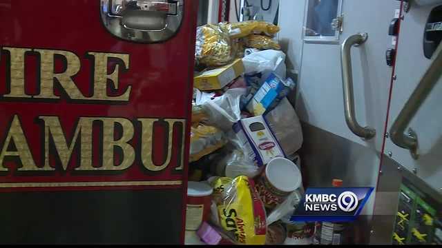 Grandview firefighters deliver ambulance full of donated food