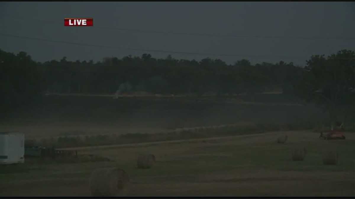 Wildfire sparked by farmer bailing hay