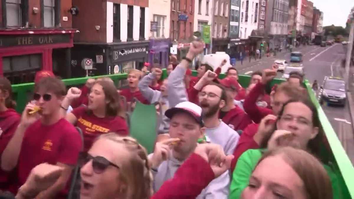 Iowa State band rides around Dublin in double-decker bus playing fight ...