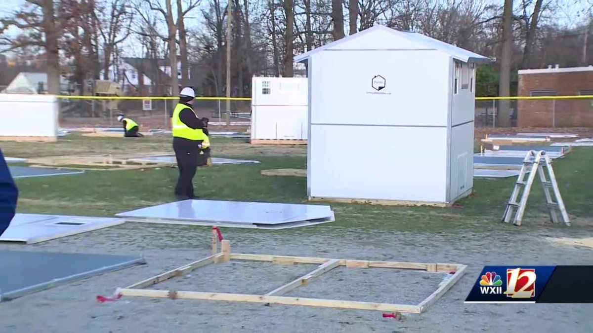 Interactive Resource Center, city of Greensboro building temporary pallet housing for homeless