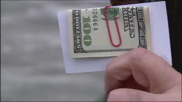 kcci archives: secret santa brightens holidays by handing out 100 dollar bills