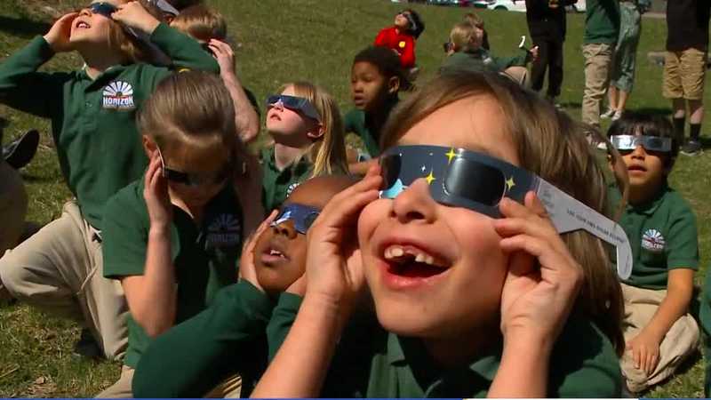 'I don't want to stop looking at it': Kids marvel at solar eclipse at Horizon Science Academy