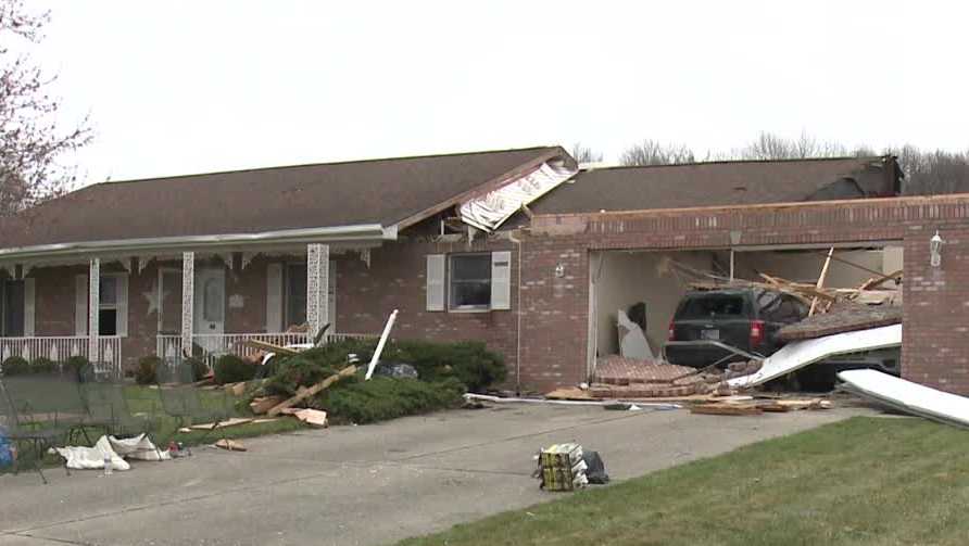 Neighbors pick up the pieces after tornado, storms rip through Indiana