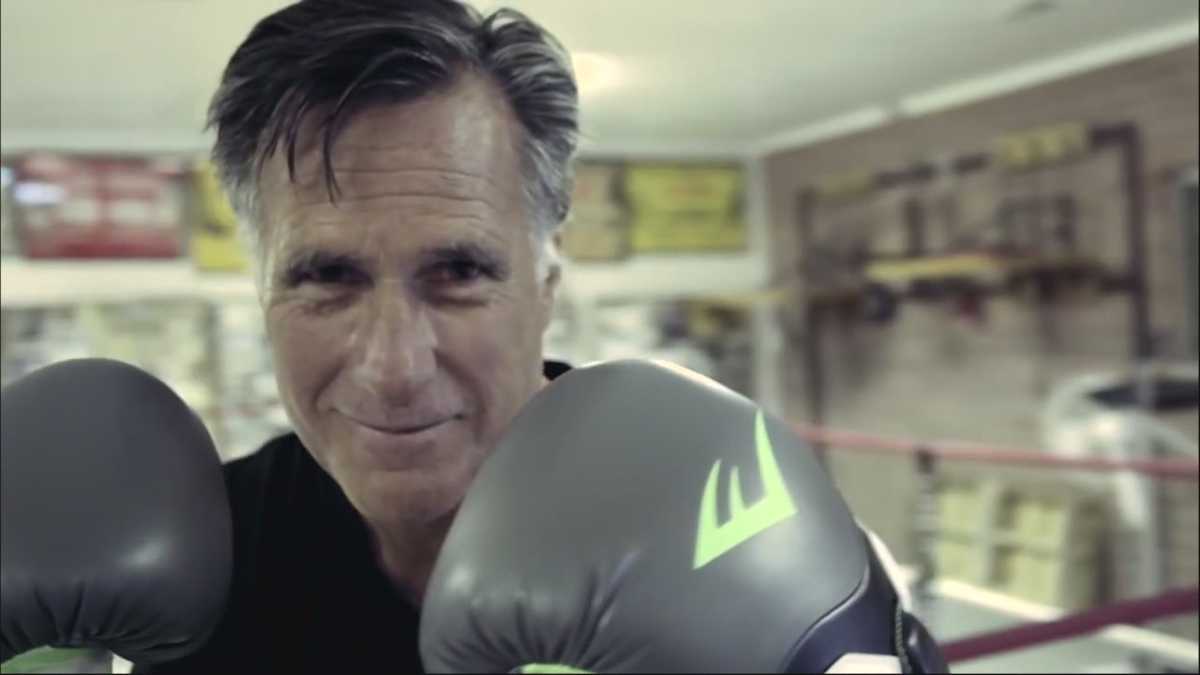 Mitt Romney takes on Evander Holyfield in boxing ring