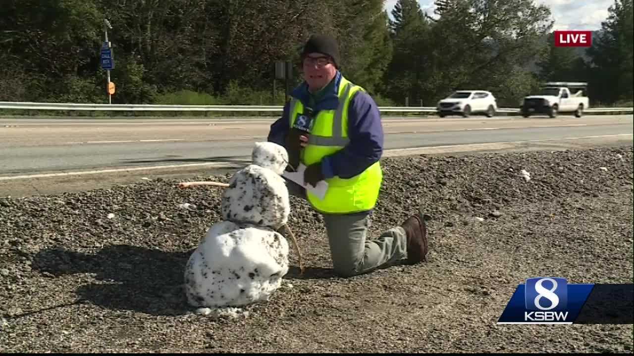 Snow falls on Highway 17 summit in the Santa Cruz mountains