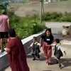 Dramatic video shows woman and two children narrowly escaping Nepal flash flooding