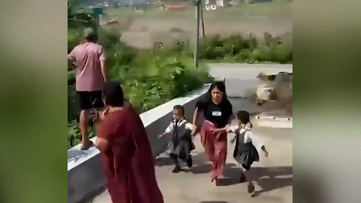 Dramatic video shows woman and two children narrowly escaping Nepal flash flooding