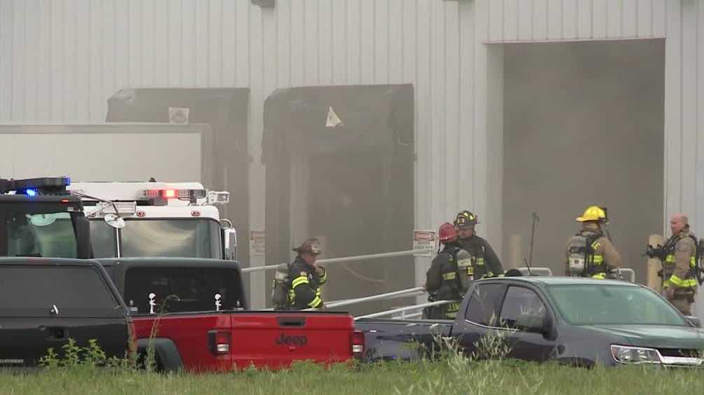 2 treated for smoke inhalation after fire at Iowa warehouse