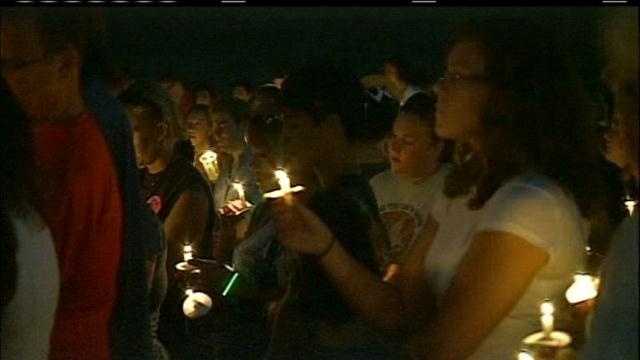 Hundreds gather in memorial park for hate crime vigil