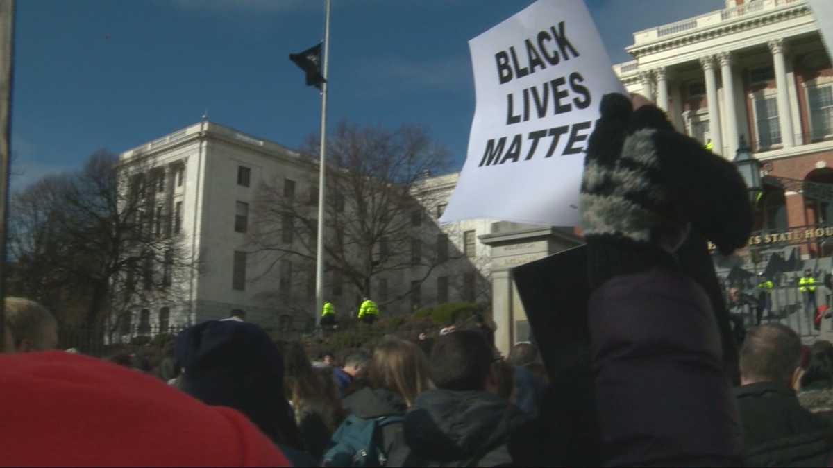 Signs express frustration, hope during Boston protests