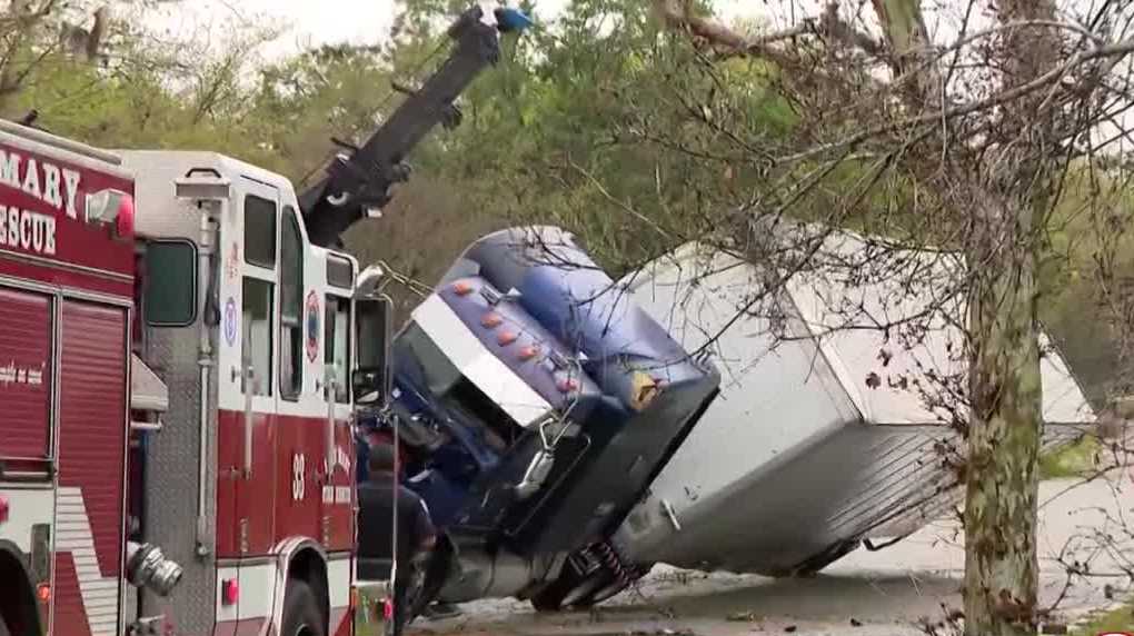 NextImg:Driver, dog in semi-truck when it flipped during Lake Mary tornado