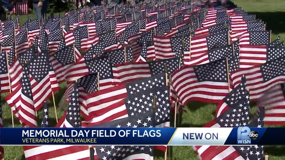 Volunteers place more than 7,000 flags for vets in time for Memorial Day